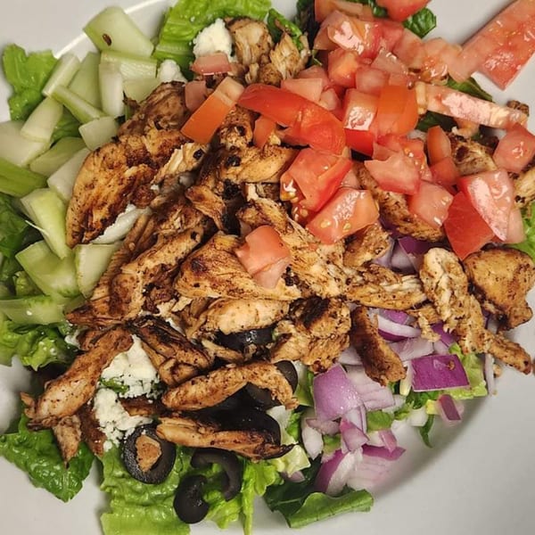 Eddington House's American chicken salad with lettuce, celery, tomatoes, red onion, olives, and feta.